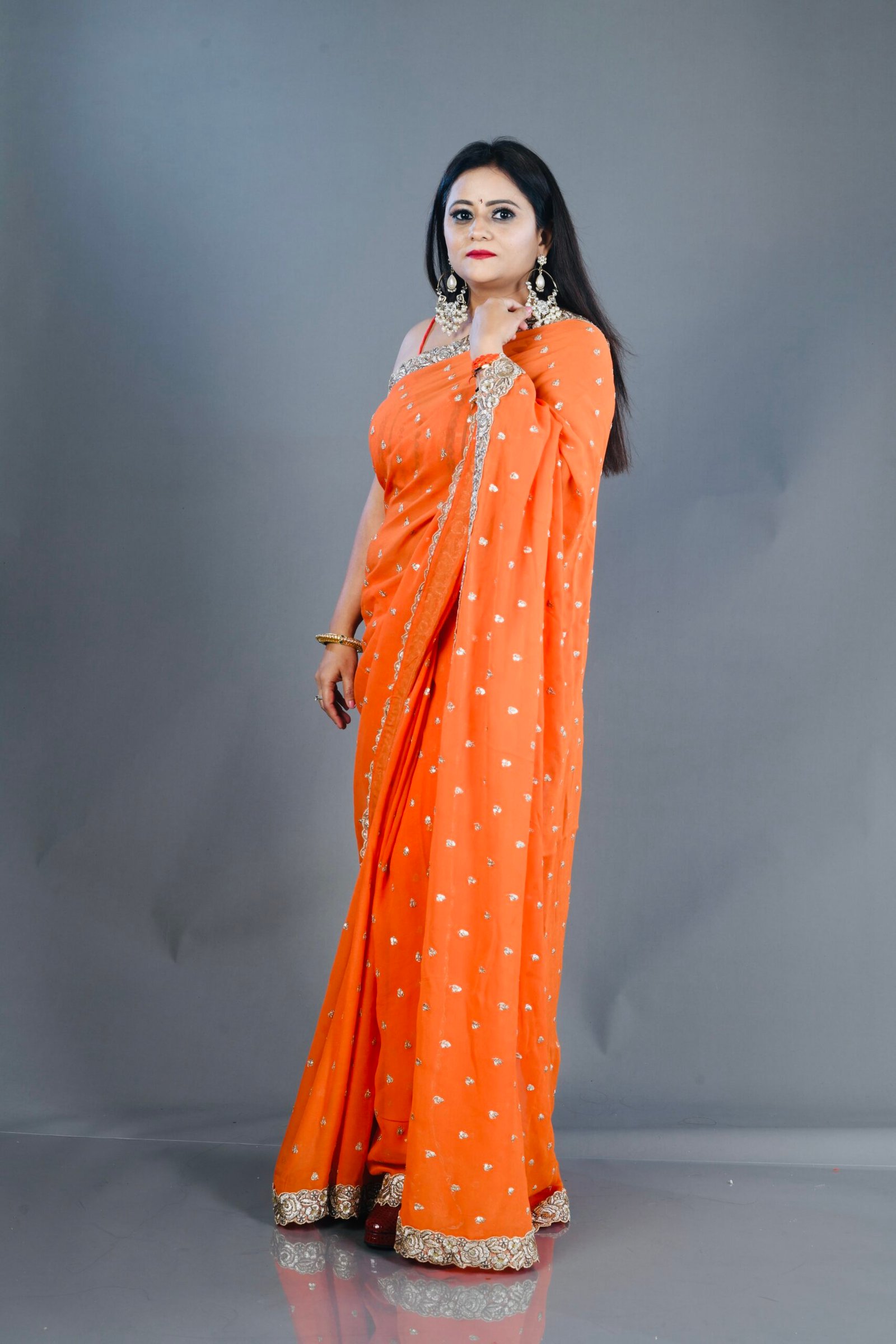 Beautiful Orange Georgette with Small Booties